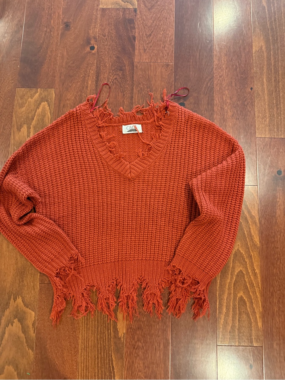C&C California Women's Distressed V-Neck Sweater in Rust Orange